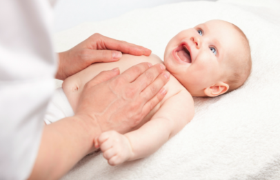 Happy baby taking massage