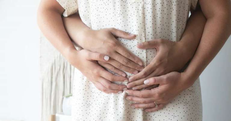 an expectant mother and her partner