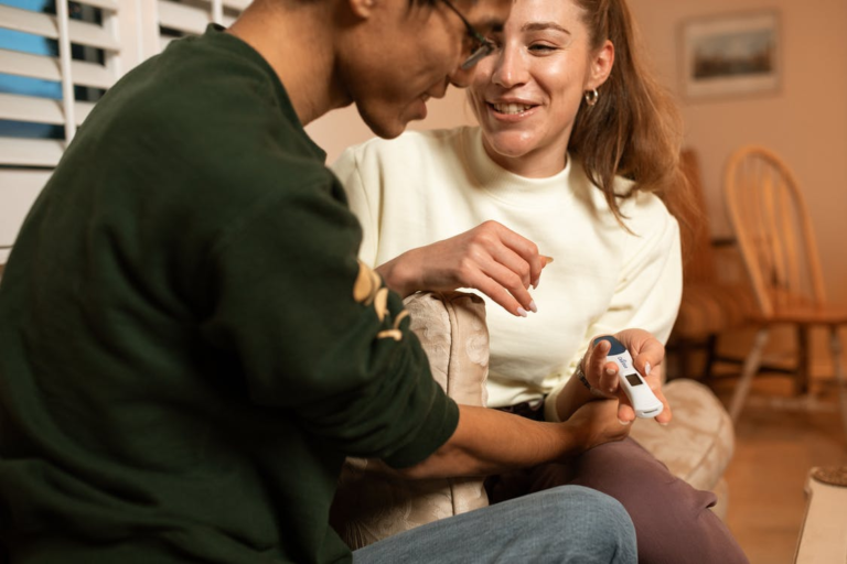 A pregnant woman showing her positive pregnancy results to her partner